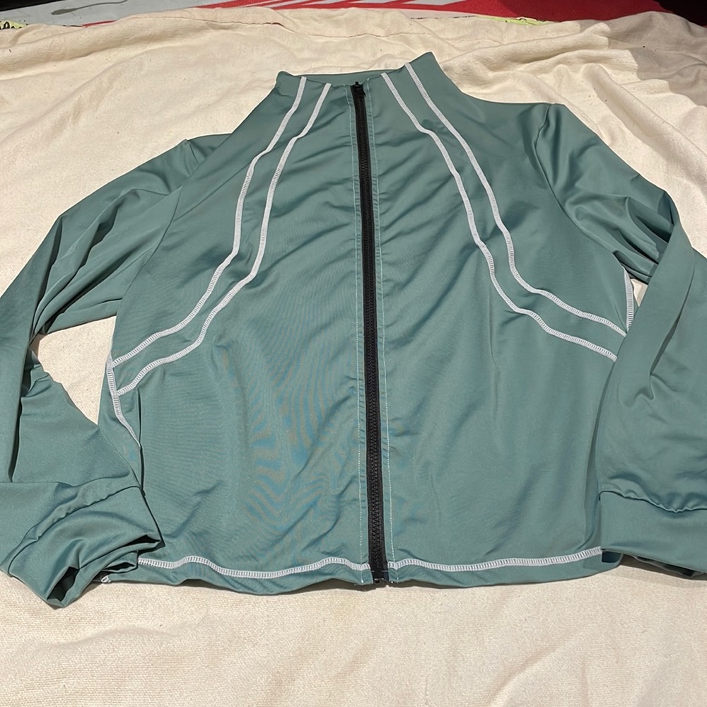 Women’s zip up, athletic long sleeve jacket from SHEIN.